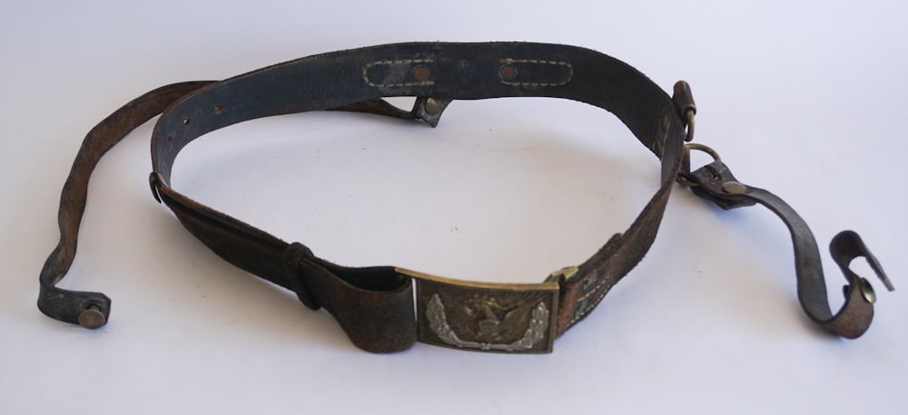 Period Civil War Union Belt Buckle & Belt: M1851 model buckle having a very nice patina throughout and complete with what looks to be an original leather belt from the period. Buckle only: W3 3/8" H2 1/8"