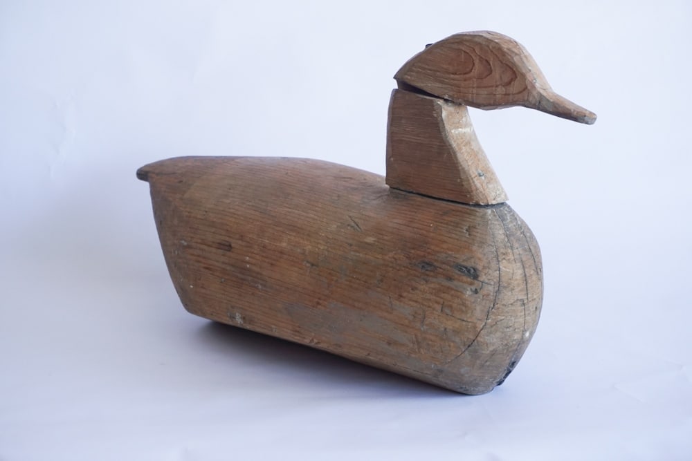 Antique Carved North Carolina Duck Decoy: Attributed to Bob Morse, Knotts Island. Bearing marks for the Hog Island Gun Club at the underside. L16 1/4"
