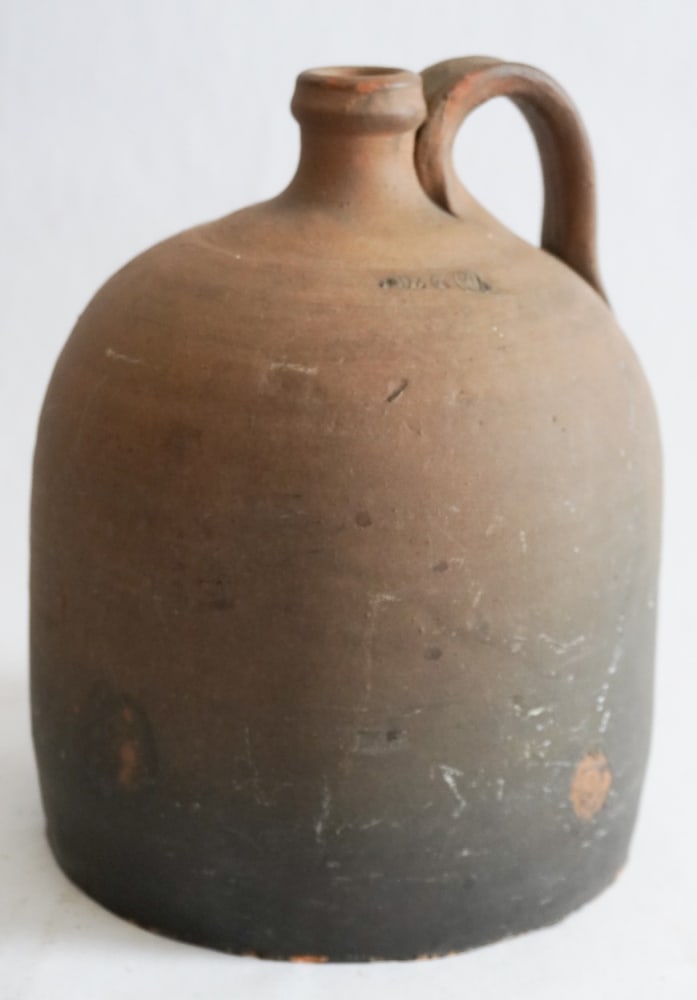 Uncommon Signed North Carolina Stoneware Jug: Last quarter of the 19th century by Poe and Co. Nicely formed jug having makers stamp at shoulder. Nice condition, no restorations or repairs. H10"