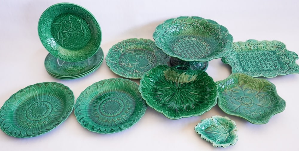 Collection Wedgwood Green Majolica Table Wares: Excellent collection including ten fine pieces all marked and in good overall condition throughout. Each signed. One small nick to the foot of a dish. No other damage detected. Largest: W10" Sold from