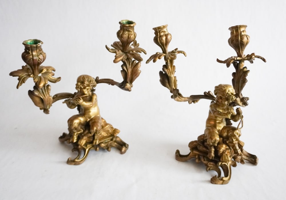 Pair Antique French Rococo Bronze & Gilt Candelabr: Circa 1880. Having excellently sculpted and cast form with two lights each. Nice patina throughout. H12" W10" Sold from the collection of a South Boston, Virginia Family.