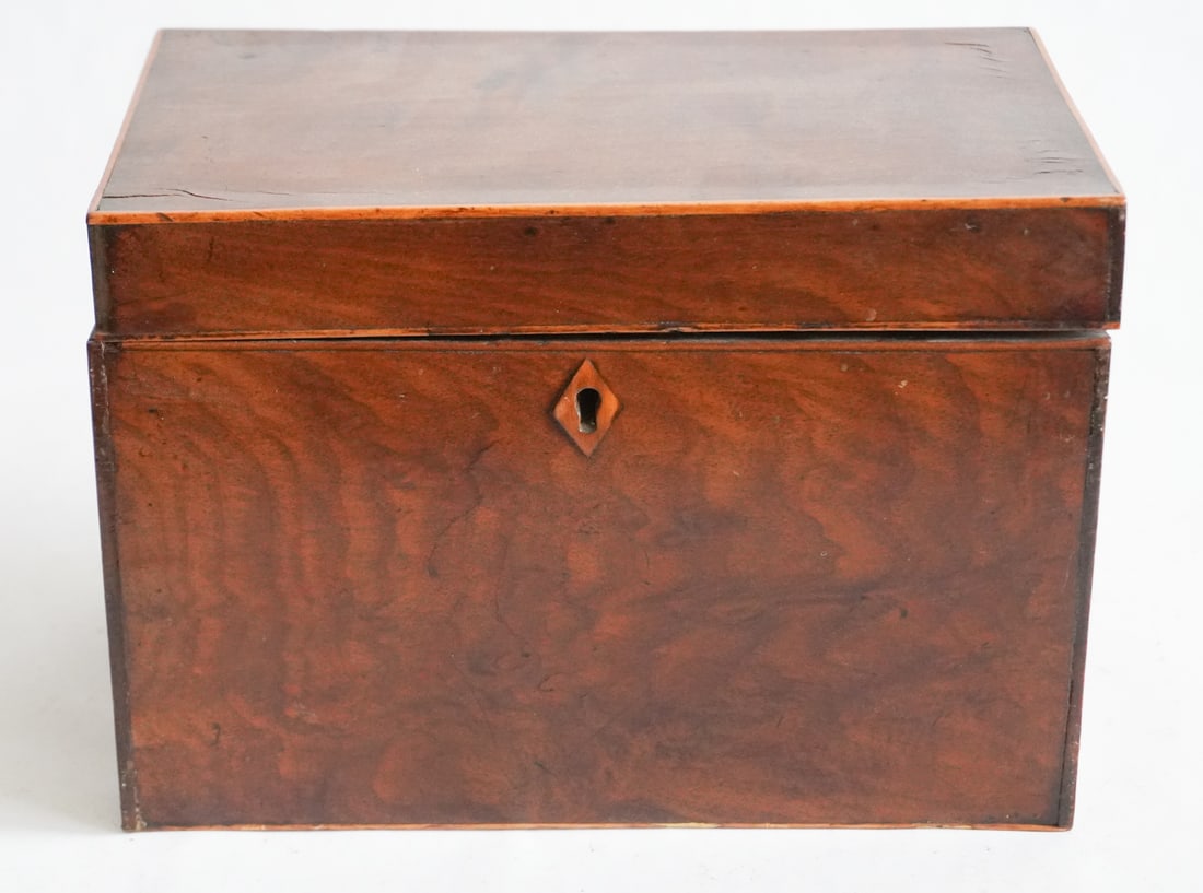 Fine English George III Inlaid Mahogany Tea Caddy: Circa 1820. Having a nicely figured case with satinwood banding and with compartments having lids within. H5 3/4" W8 1/4" D5" Sold from the collection of a Columbia, South Carolina family.