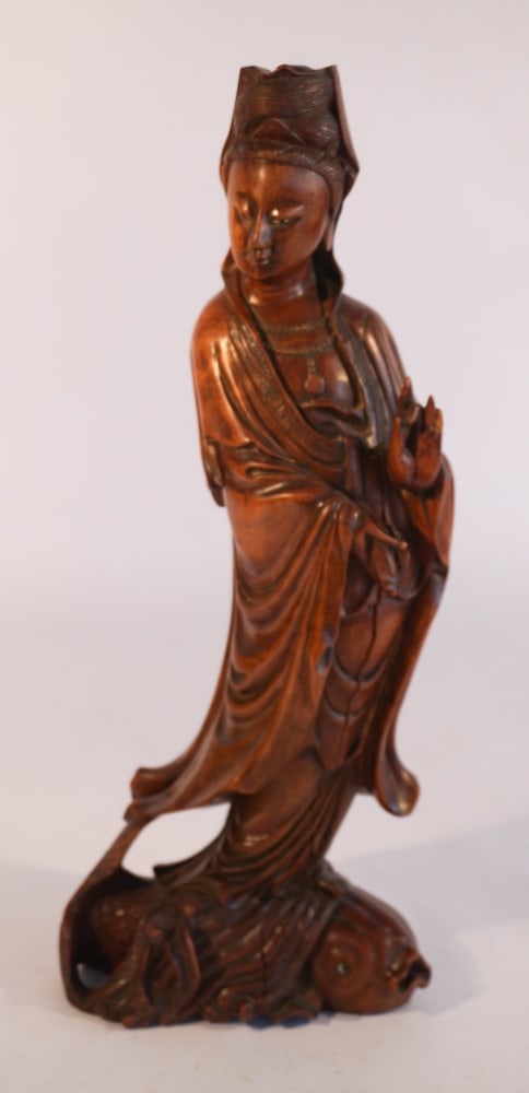 Antique Chinese Carved Hardwood Quan Yin Figure: Circa 1900. Having been brilliantly carved with fine attention to detail. The piece has some slight shrinkage and very minor nick near the base, otherwise excellent condition. H16 1/2" Sold from the B
