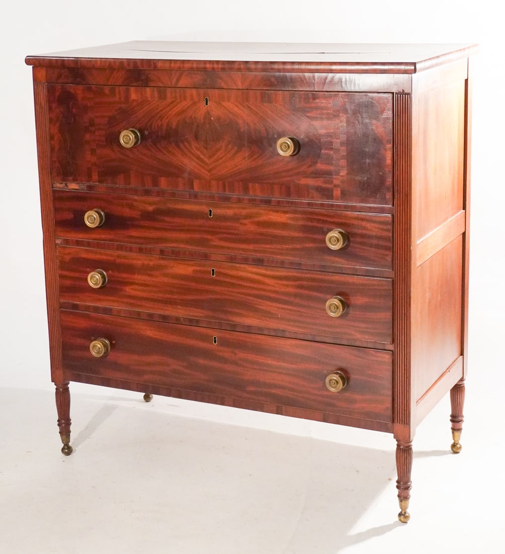 Handsome American Federal Figured Mahogany Butlers or Servants Desk: Circa 1810, likely New York City and manner of Duncan Phyfe. Having a rectangular top over the upper drawer which opens to fall front writing surface and brilliantly appointed interior over the case w