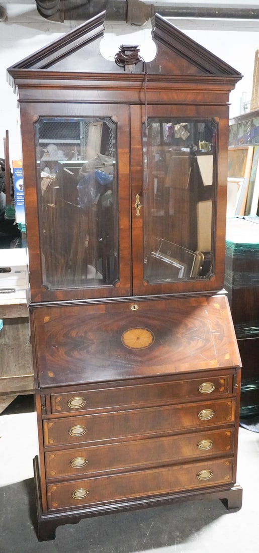 Fine Federal Style Mahogany Secretary Book Case: 20th Century by Henkman. Nicely crafted example having handsome grain and inlay. Signed at the interior. Well kept ready to be used. H90" W37 1/4" D19 3/4"