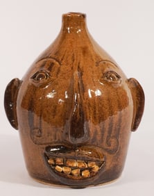 Southern Stoneware Face Jug by Otis Norris