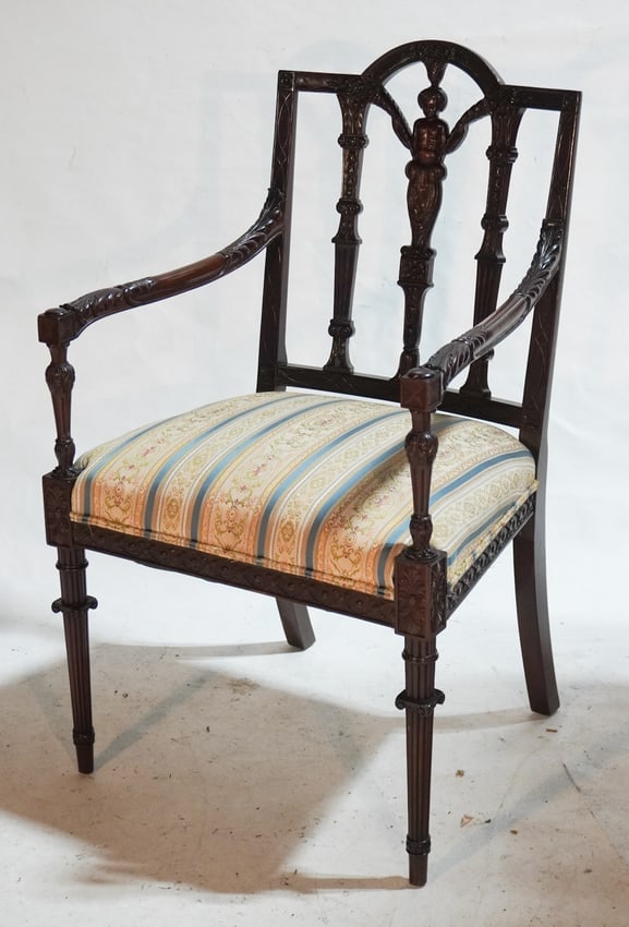 English George III Style Mahogany Arm Chair: Circa 1890. Having a brilliantly carved back leading to arms over nicely upholstered seat and over excellent tapering and carved legs. H38" W23" D20" Sold from the Braford Collection of Natural Bridge