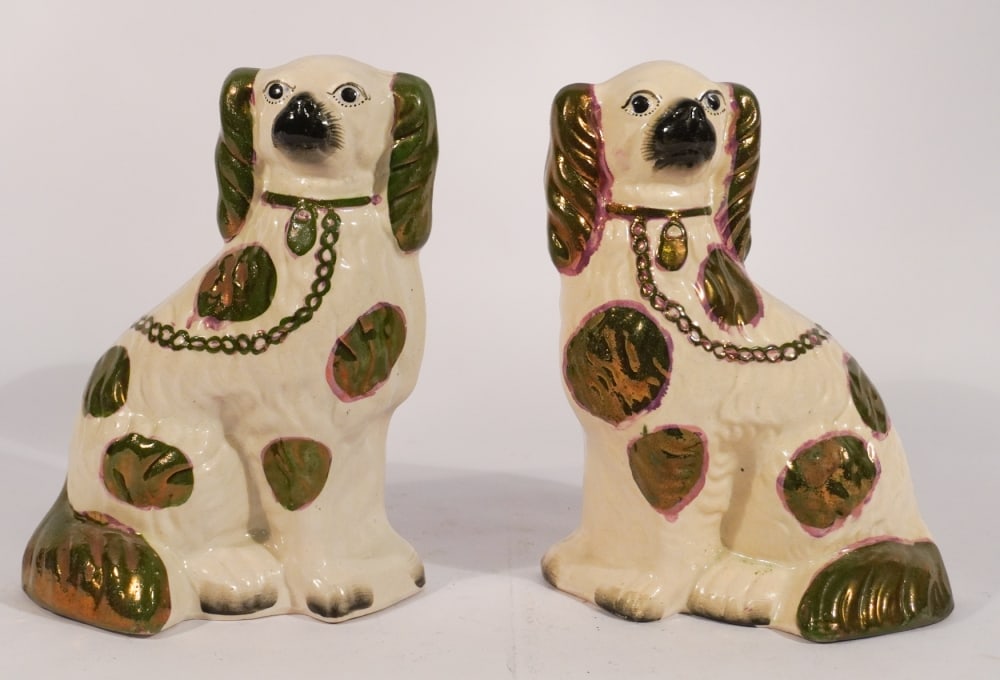 Handsome Pair Antique English Staffordshire Pottery Spaniels: Late 19th century. Handsome pair decorated with green and Sunderland accents. Good condition well kept. H9 3/4" Sold from the collection of a Marietta, Georgia family.