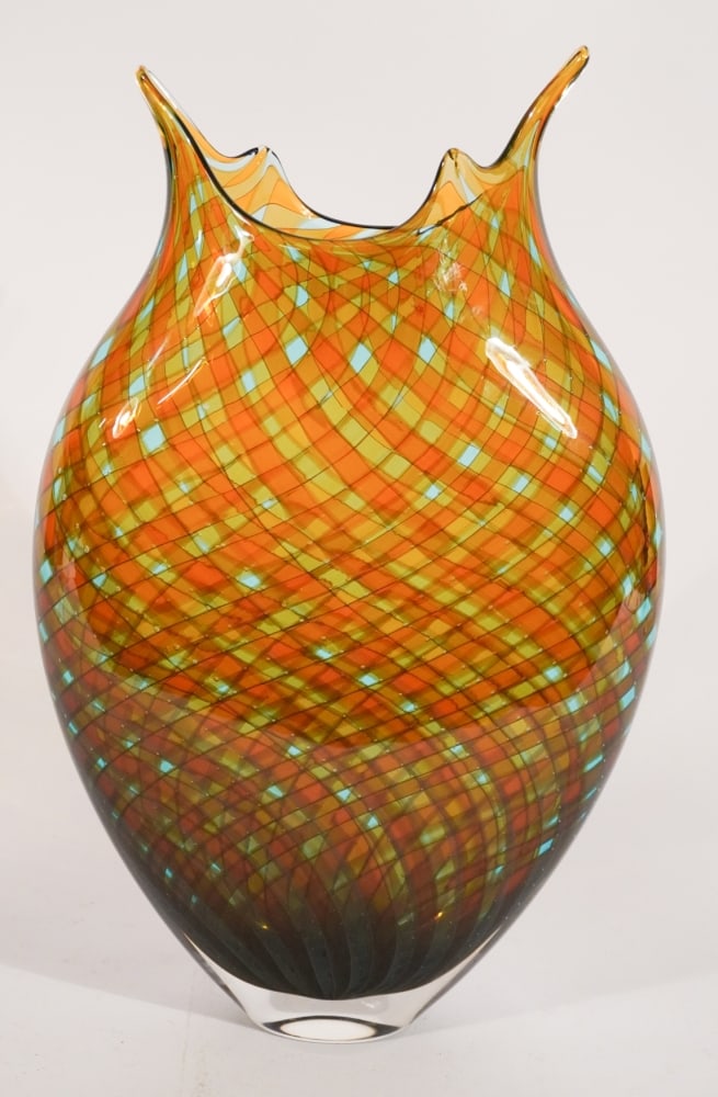 David Patchen: (United States, b. 1966) Excellent blown art glass vase with brilliant woven design in peacock colors. Signed at the underside. Excellent condition throughout. H16 1/2" W10 1/2" D3 1/2"