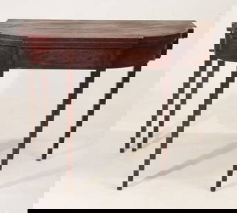 Fine American Federal Inlaid Mahogany Games Table: Charleston, South Carolina or New York City. Brilliantly inlaid example having sword and feather inlay at the top of each leg with handsomely banded freeze and tapered legs. The table has a very early
