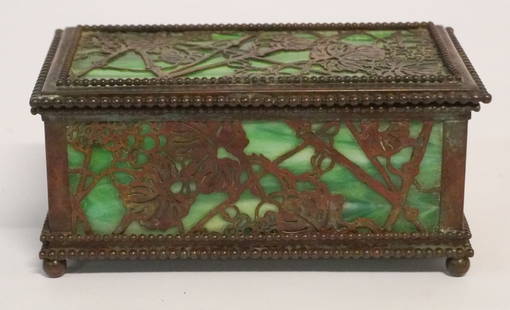 Handsome Tiffany Studios Desk Box: Charming box having brilliant patterns at all sides and excellent well kept glass. Signed at the underside. Very good condition throughout. H3" W6 5/8" D4" Sold from the collection of a Greenville, So