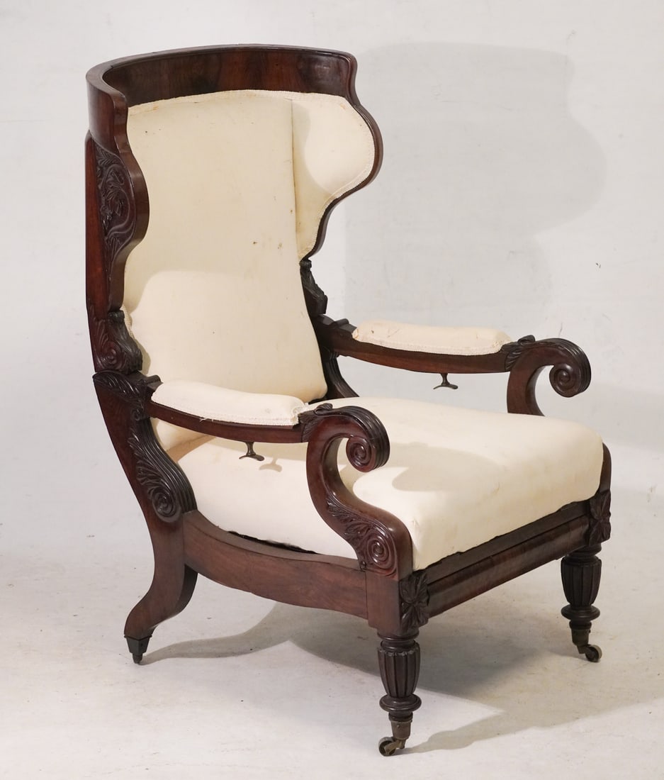 American Classical Carved Brazilian Rosewood Reclining Easy Chair: Attributed to Thomas Seymour with Carving by Thomas WhitemanCirca 1825, Boston. Having brilliant form and handsomely grained frame. The piece has an acanthus carved upper frame which is configured to