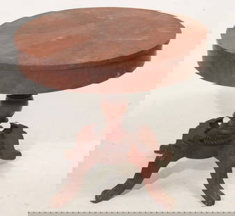Southern Figured & Carved Walnut Center Table: Circa 1830, Likely Tennessee or Kentucky. Having a fine well grained circular top over nicely turned base emitting four brilliantly carved legs ending in a delicately carved harry paw foot. Very charm