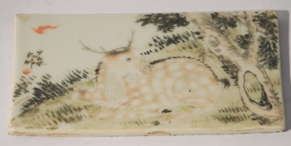 Antique Chinese Qing Period Porcelain Plaque: 19th century or earlier. Excellent hand decorated plaque with resting stag, signed upper right. Nice well kept condition throughout, no restorations or repairs. W6 1/4" H3 5/8" Sold from the Braford C