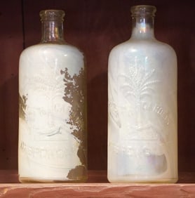 Two Antique South Carolina Dispensary Cylinder Bottles