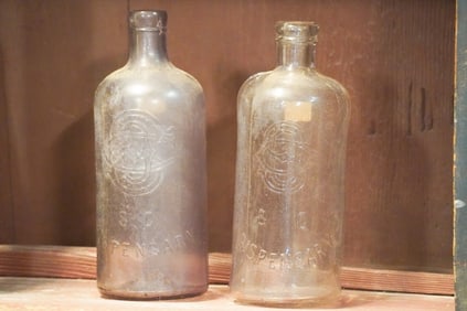 Two Antique Cylinder SC Dispensary Bottles