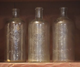 Three Antique South Carolina Dispensary Bottles