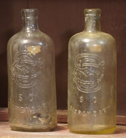 Two Fine Antique South Carolina Dispensary Bottles