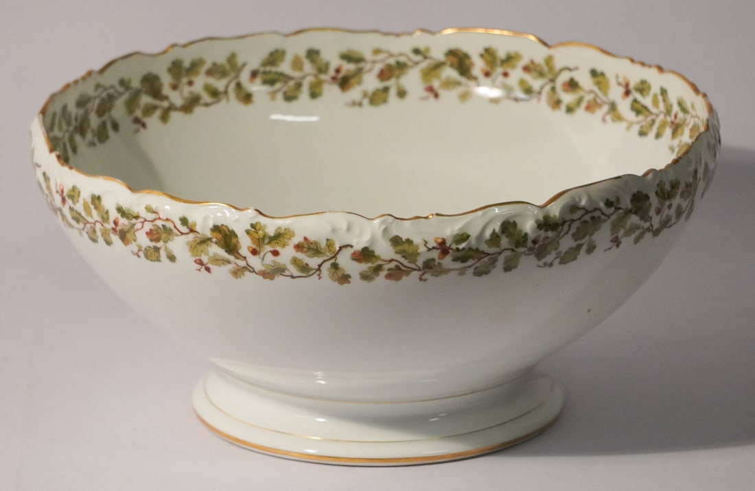 Antique French Hand Decorated Porcelain Punch or Center Bowl: Circa 1890. Nice large size punch bowl having excellent hand decorated acorn and leaf at inner and outer rim trimmed with gilding. Marked at the underside. W14" H6" Sold from the collection of a Mario
