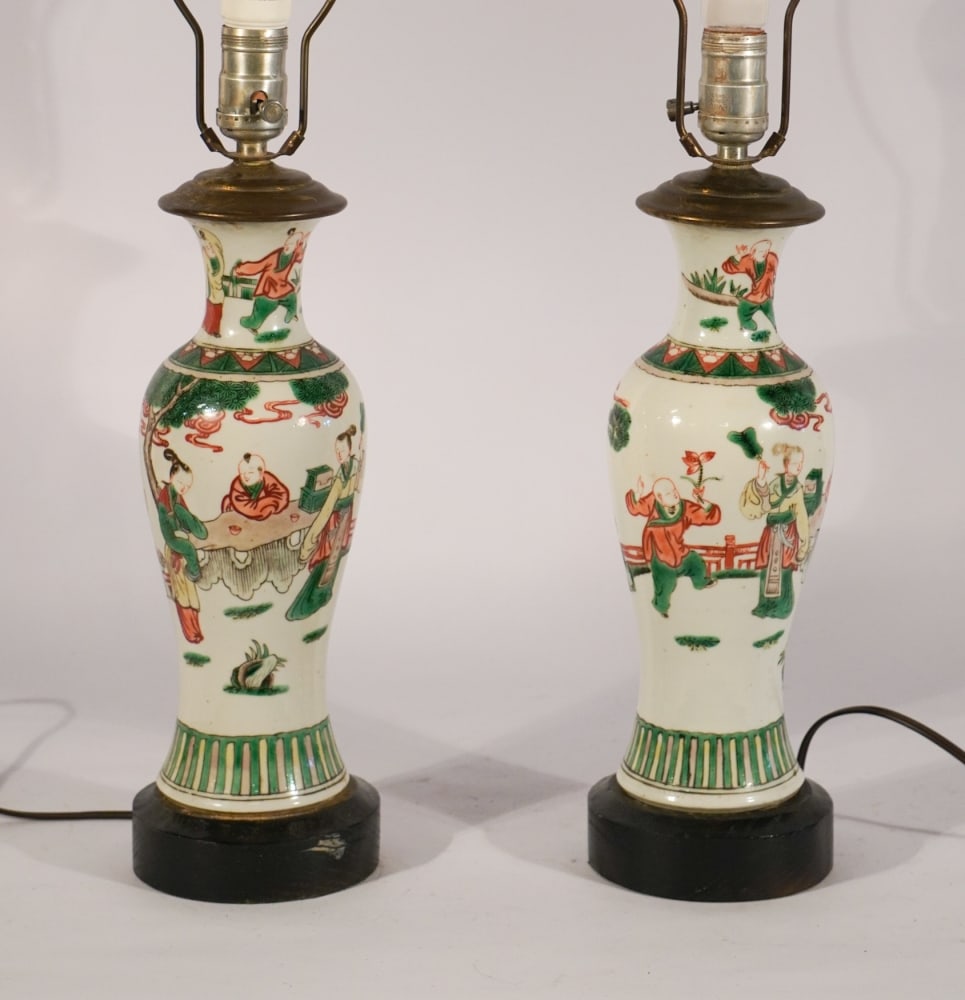 Fine Pair Antique Chinese Famille Verte Vases: 19th century. Qing period porcelain vases converted to lamps. Excellent well decorated examples each drilled as lamps but otherwise in good condition. Urn size: H12" (only without lamp parts)