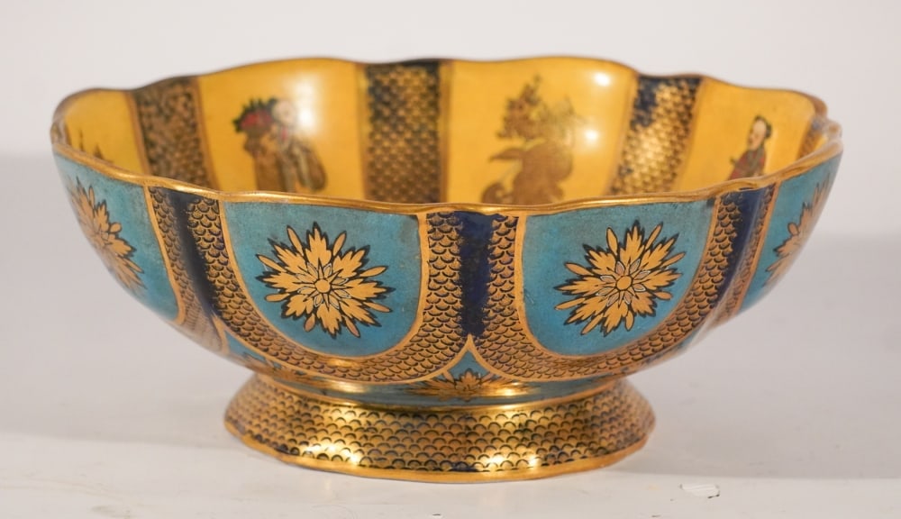 Uncommon Antique English Masons IronStone Punch or Center Bowl: 19th century, in the Chinese style. Having brilliant imperial yellow ground decorated interior centered by blue glazed decoration and figures alongside dragons at interior. The exterior is brilliantly