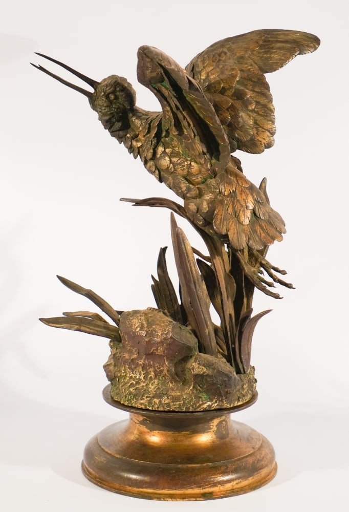 Jules Moigniez: (France, 1835-1894) Gilded bronze figure of elegant shore bird in flight through the reeds. Exceptional patina throughout. The piece stands nicely atop original circular base. H20 1/2" (including the