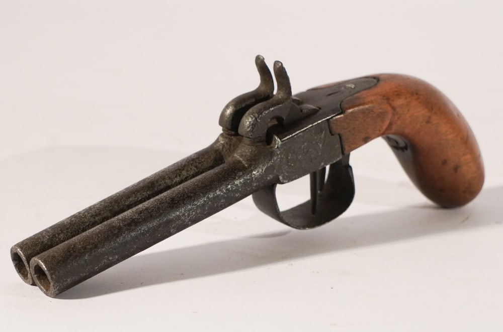 Antique French Percussion Side By Side Pistol: Likely late 18th century. Handsome pistol having rifled barrels which show signs of chased decoration. Very nice patina throughout. Total: L8" Sold from the collection of a Highlands, North Carolina g