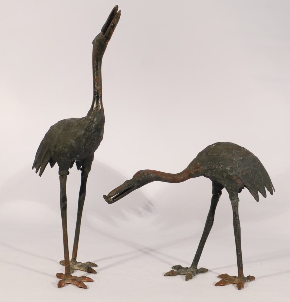 Excellent Pair Antique Japanese Cast Iron Crane Sculptures: Early 20th century. Pair having very nice form and nice patina throughout. Excellent sturdy shape. Very nice surface with only scattered rust. Marked at underside of the foot. H21 1/2" Sold from the c
