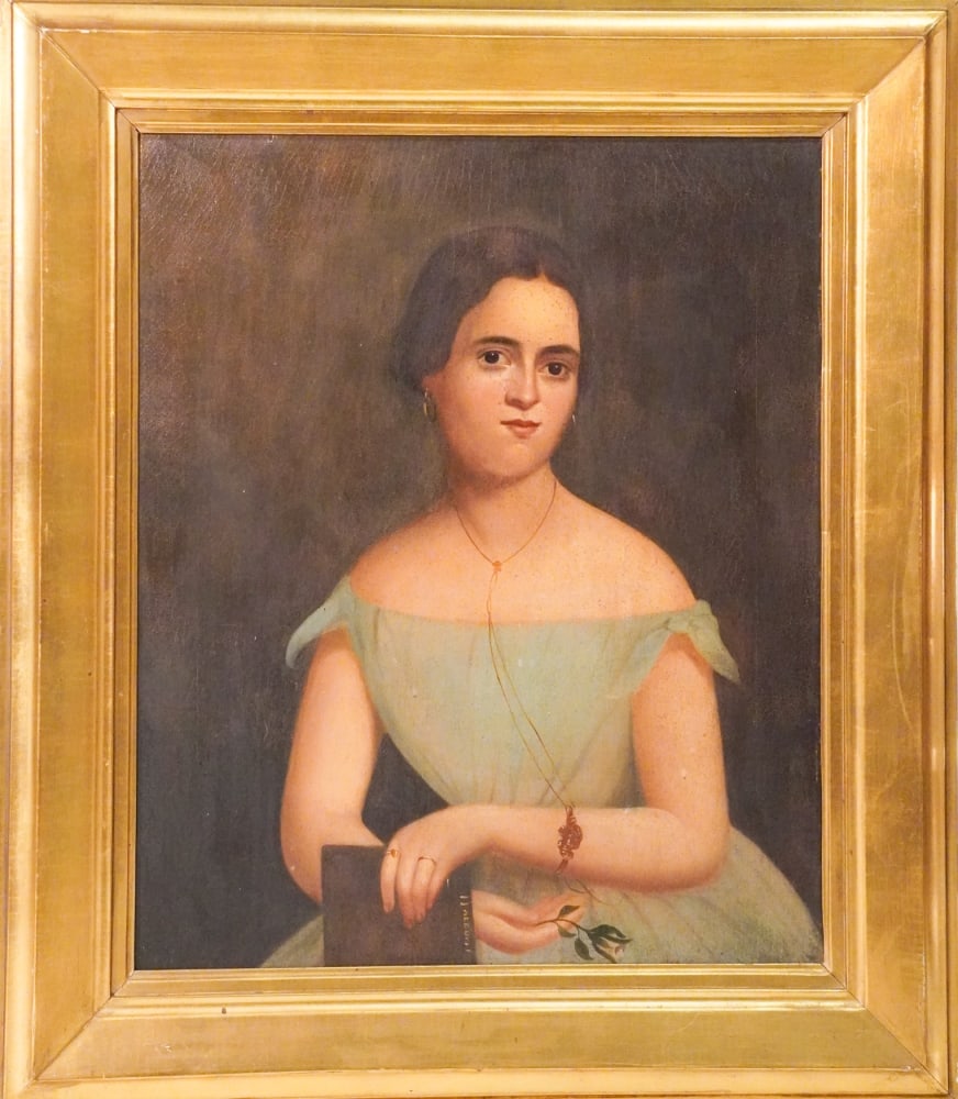 American or Spanish School: Circa 1860. Oil on canvas portrait of a young woman having been very nicely rendered and with flower in hand. The piece has Olivia and dated of 1864 on verso written likely by the conservator as the p