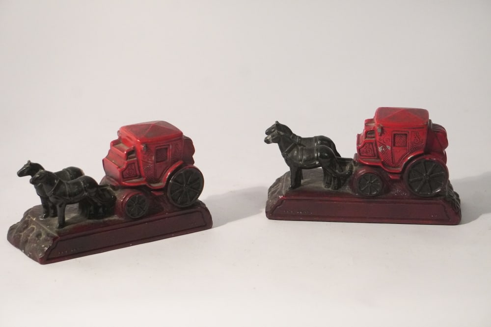 Charming Antique Cold Painted Metal: Sporting Bookends Late 19th century pair having charming form of stage coaches. Each with a nice old painted surface. W6 1/2" D3" H4" Sold from the collection of a Columbia, South Carolina lady and ge