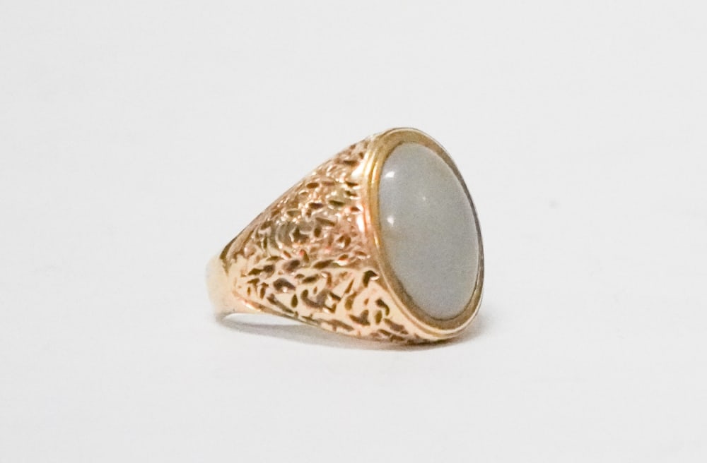 Excellent Antique Chinese 22k Gold & Blue Jade Gentleman's Ring: Circa 1900. Having been brilliantly crafted and with a very fine jade cabochon stone at the center. 16 grams standard Sold from the collection of a Washington, Georgia gentleman.