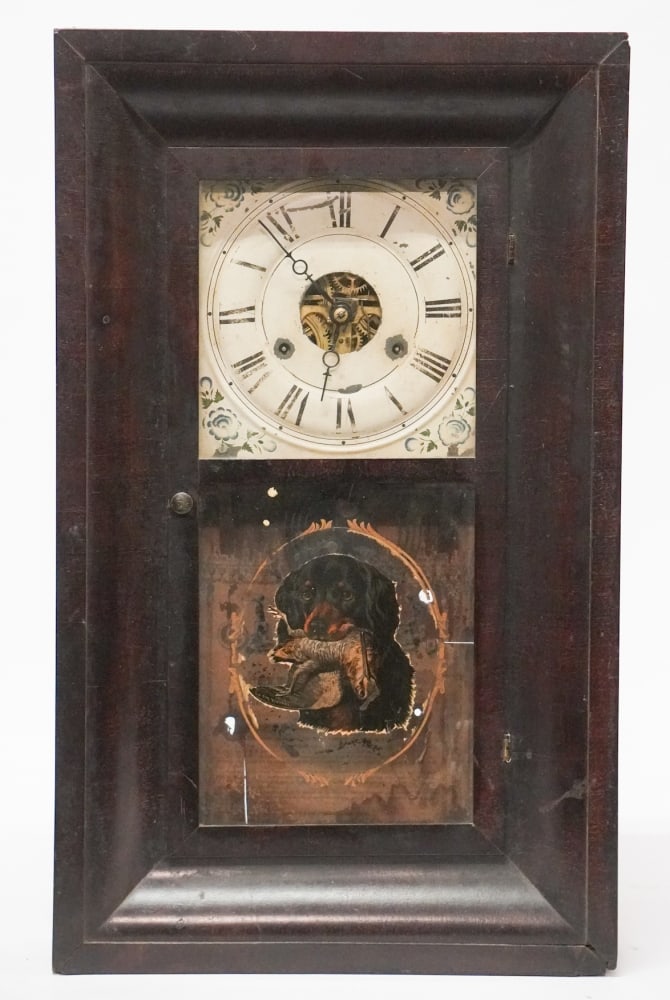 Charleston South Carolina Classical Ogee Clock: Mid 19th century. McElever and Sutton labeled clock having reverse painted tablet with spaniel at the bottom tablet and wood cock in its mouth. H26" W15 5/8"