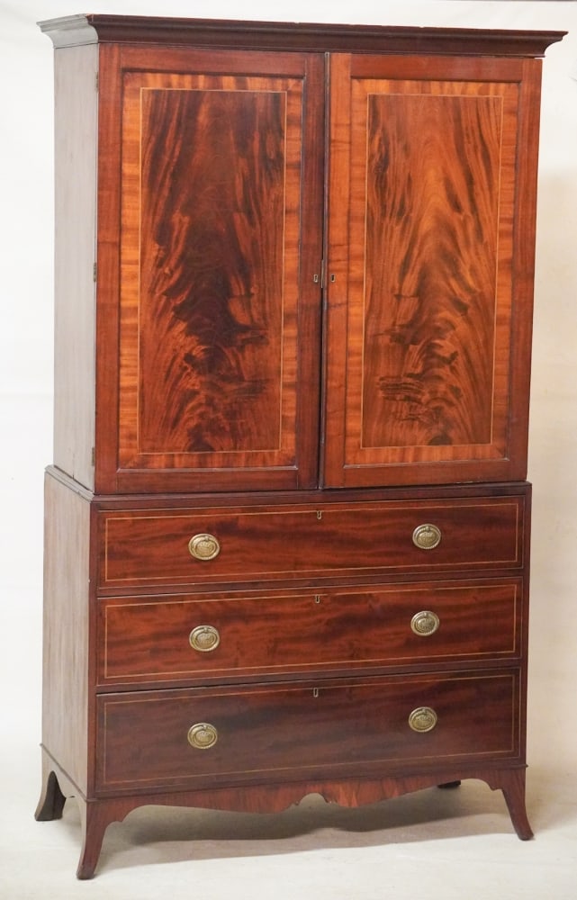 Important New York City Labeled Federal Inlaid & Figured Mahogany Linen Press: Circa 1800, by New York maker Slover and Taylor. The piece retaining its original paper maker's label at the top of the lower case which has been framed with a handsome brass and glass plaque to prese