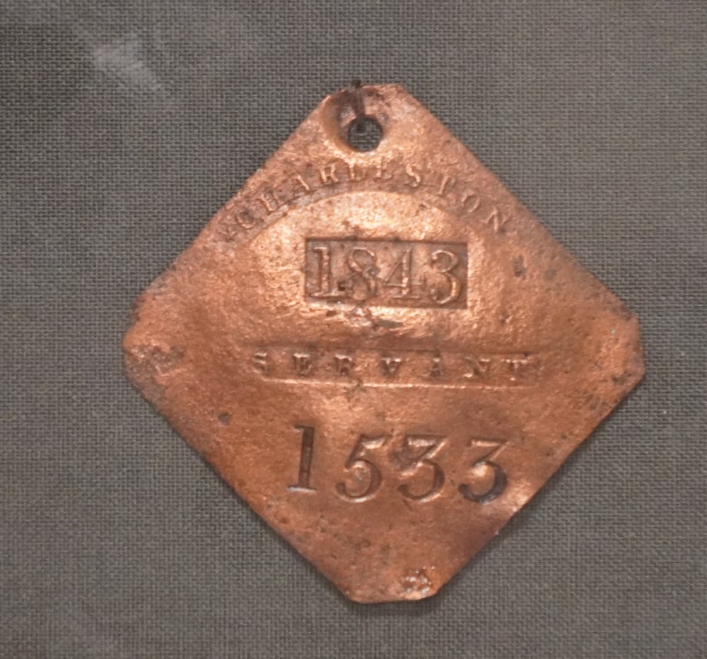 Period Charleston South Carolina Copper Slave Tag Dated 1843: Possibly by William Rouse (1812-1888), Charleston, SC. The piece is marked CHARLESTON 1843 and SERVANT over number 1533. The piece has been cleaned at some point but shows excellent signs of age and