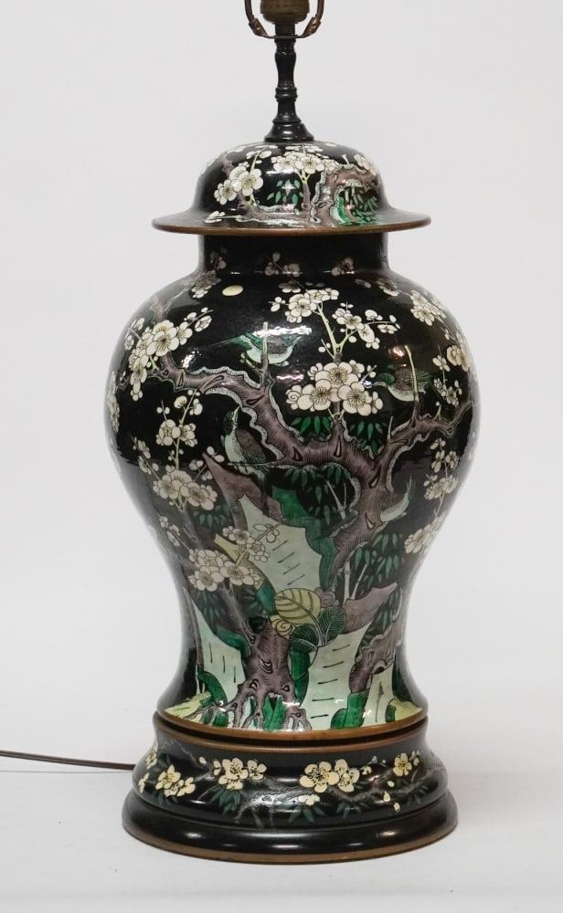 Antique Chinese Qing Period Porcelain Lidded Jar: 19th century example converted to a lamp. Excellent form having original lid over well decorated body atop wood stand. Urn Only: H15 1`/2" Total size:H 36" Sold from the collection of David Varnell an
