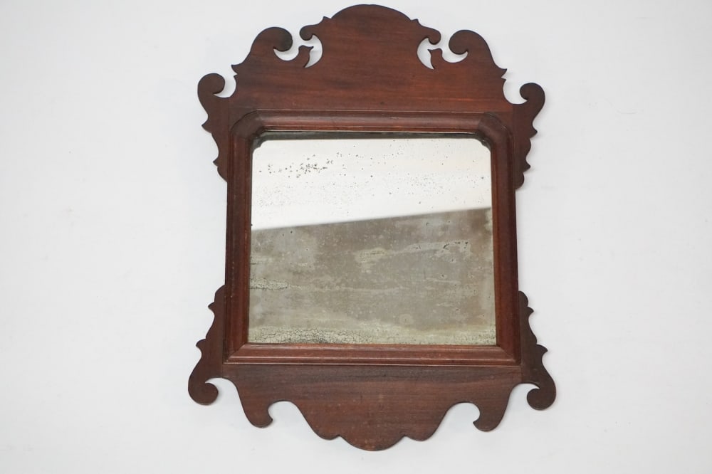 Handsome Federal Figured Mahogany Looking Glass of a Smaller Size: Circa 1810. Having a nice stout form with well shaped framed centered by early looking glass likely original to the piece. W15 3/4" H21" Sold from the collection of a Charleston, South Carolina gentle