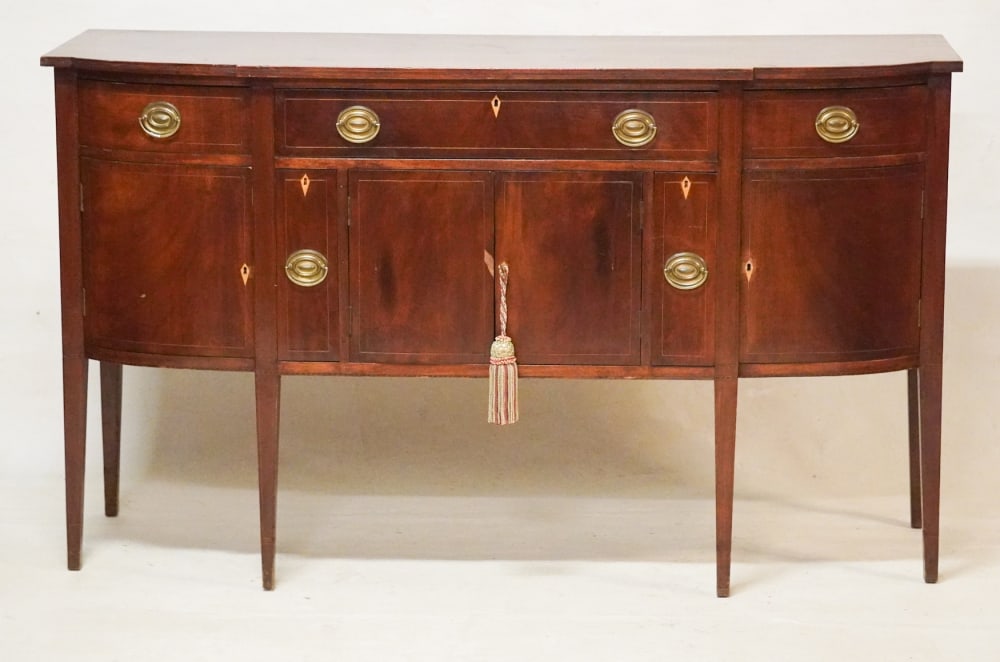 Excellent American Federal Figured & Inlaid Mahogany Sideboard: Circa 1810, likely New York City. Very handsome example having well figured top over nicely banded case having upper drawers over lower doors center doors flanked by handsome fitted bottle drawers all