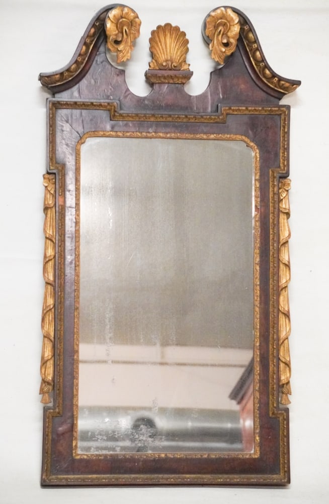 Handsome English George III Carved & Gilt Mahogany Looking Glass: Excellently carved frame with handsome broken arch pediment over well grained frame centered by looking glass. H45" W23" Sold from the collection of David Varnell and Paul Iwao of South Carolina and N