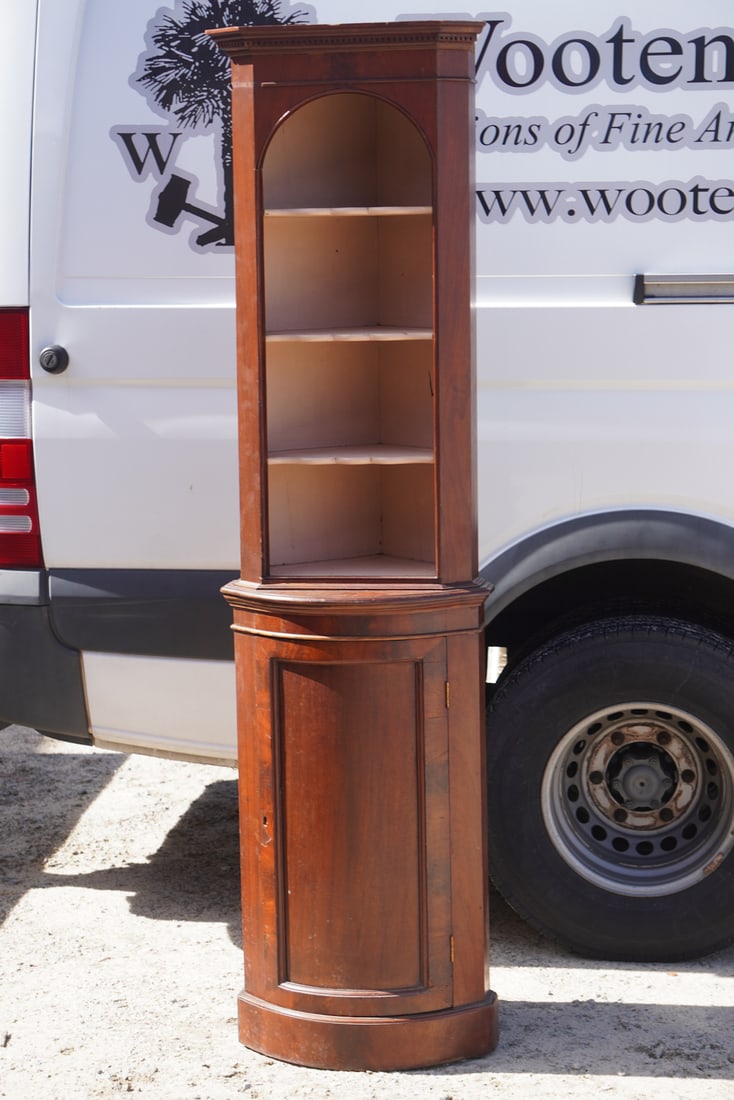 Handsome English George III Mahogany Diminutive Corner Cabinet: Circa 1850. Having a dentil molded crown over handsome open top with shelves over the lower case having hinged door. Charming smaller size example. H72" W20" D20" Sold from the collection of a Greenvi