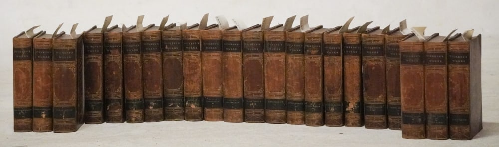 Antique Leather Bound Vols Dickens Works 1877: 22 Vol Set in well kept condition. Sold from the collection of Limestone College, Gaffney, South Carolina