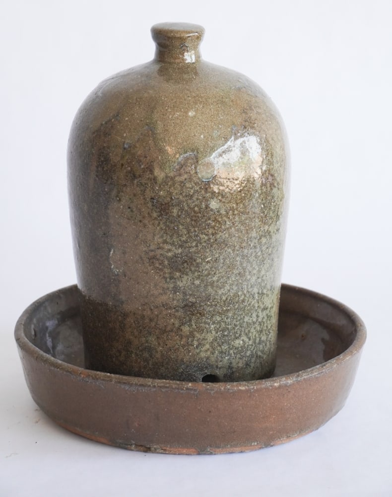 Very Rare South Carolina Stoneware Poultry Waterer With Bowl: Laurens Co, South Carolina attributed to the Johnson Family. The piece having brilliant form and glaze and is accompanied by what is likely its original bowl. Good condition throughout. H12 1/4"