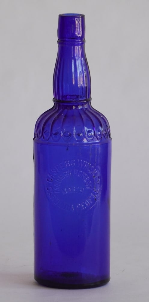 Very Fine Antique Casper Cobalt Blue North Carolina Whiskey Bottle: Excellent example having brilliant form. Very good well kept condition. H12"