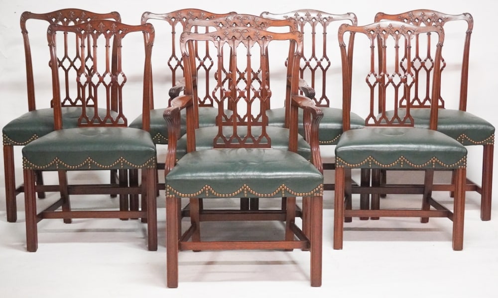 Exceptional Set of English George III Style Carved Mahogany Dining Chairs: Early 20th century, Britain. Handcrafted set brilliantly carved in the Chippendale style and with handsome leather upholstered seats all in excellent condition throughout. H37" W21" D18" Purchased dec