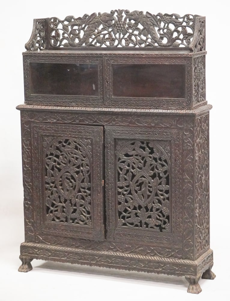 Fine Antique Anglo Indian Carved Hardwood Display Cabinet or Bookcase: 19th century. Having been brilliantly carved with glazed doors at upper case over pierced and carved doors at lower case possibly to house spices or food. Brilliant example very intricate. Excellent e