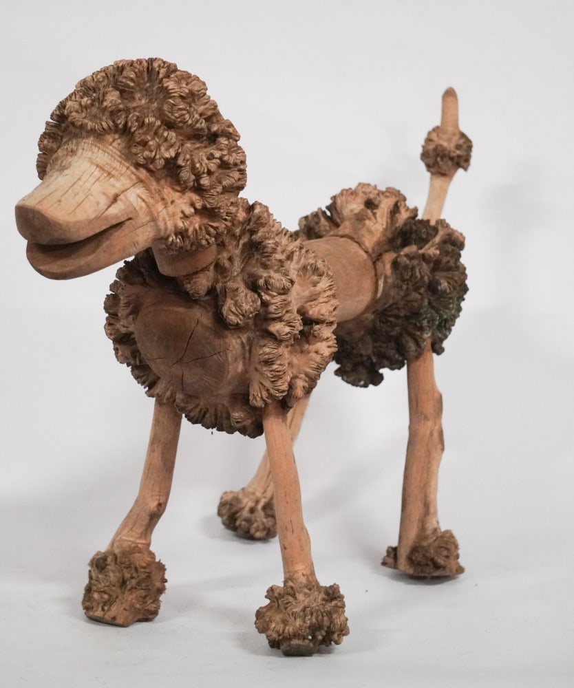 Very Charming Vintage Folk Art Carved Lifesize Wood Poodle Dog: Mid 20th century. Hand crafted poodle having burl walnut body with handsome roots used at the head body, feet and tail. Good condition, no apparent signature. H18" Sold from the collection of an