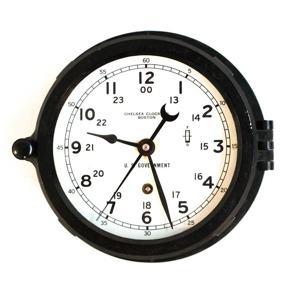 Chelsea ship's clock, Boston, MA: 20th century. round bakelite case housing an eight-day movement with sweep second hand, 5 dial. Dia.7 1/2""