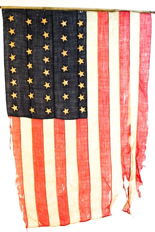 American thirty eight star handmade flag: 19th century with 19th century eagle finial. hand sewn from homespun fabric. H50 1/2 W78""