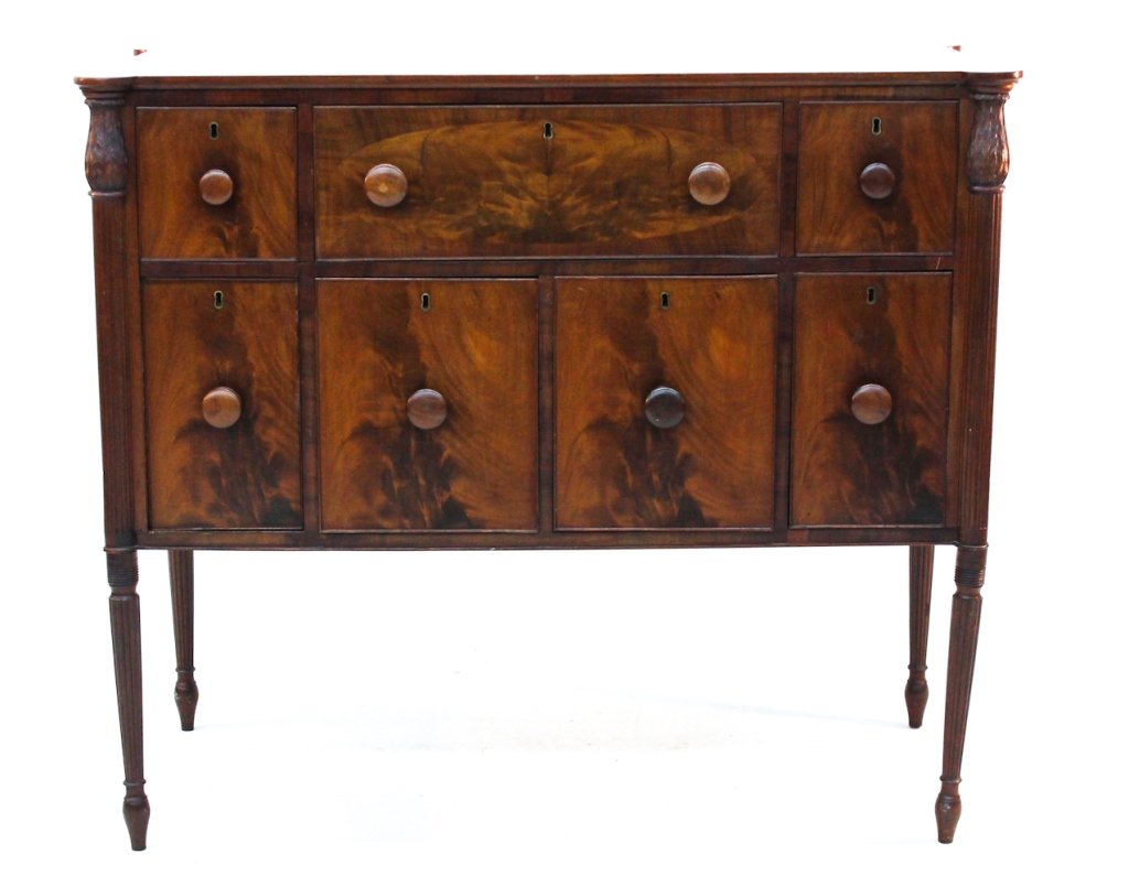 American Federal carved mahogany sideboard: New England, circa 1810. H41 3/4" W48 1/4" D23 1/4"