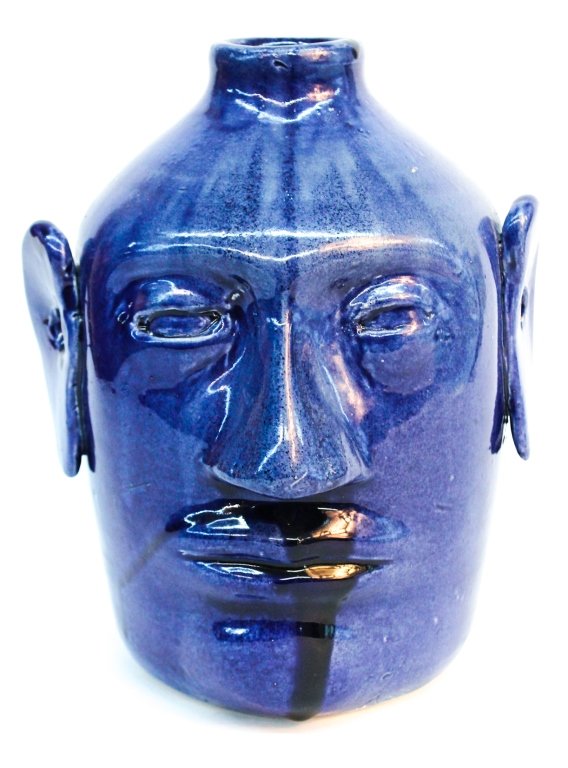 Unusual large Edwin Meaders stoneware face jug: signed on base. H10 3/4" W9 1/4" Private Upcountry South Carolina estate.