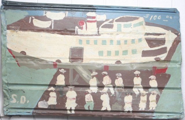 Sam Doyle: (Edisto, South Carolina, 1906-1985) two-sided paint on tin. "Easter Ferry" signed lower right, other painted "Your Track is 12 inches long 4 inches wide". H26" W41 3/4" Note: This work is from the est